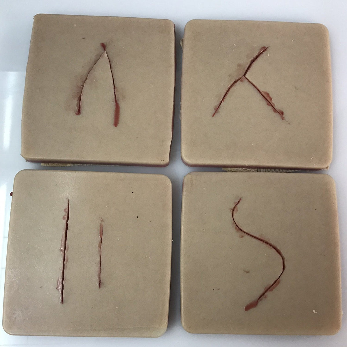 Suture Pad x 4 Precut